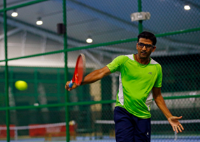 Tennis private class in indoor setting